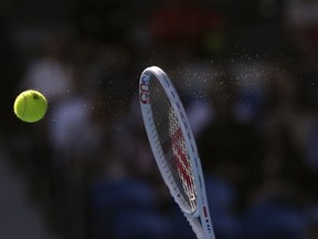 Athletes compete during a match at the Australian Open tennis championships at Melbourne Park, Melbourne, Australia, Monday, Jan. 22, 2024.