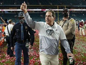 FILE - Alabama head coach Nick Saban leaves the field after their win against Ohio State in an NCAA College Football Playoff national championship game, Tuesday, Jan. 12, 2021, in Miami Gardens, Fla. Nick Saban, the stern coach who won seven national championships and turned Alabama back into a national powerhouse that included six of those titles in just 17 seasons, is retiring, according to multiple reports, Wednesday, Jan. 10, 2024.