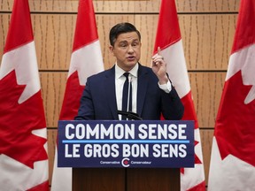 Conservative Leader Pierre Poilievre address the national Conservative caucus on Parliament Hill on Jan. 28, 2024.