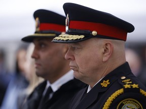 Toronto police say they've arrested three people for allegedly holding a protest on a highway overpass where demonstrations have been officially banned as of this week. Toronto Police Chief Myron Demkiw attends a press conference in Toronto on Monday, May 1, 2023.