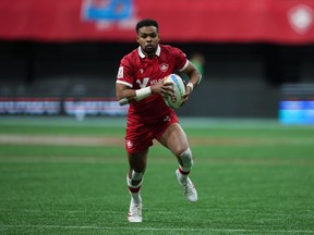 Canada's Josiah Morra runs the ball for a try against Chile during HSBC Canada Sevens rugby action, in Vancouver, on Saturday, March 4, 2023. Canada's men have been drawn in Pool A with Argentina, South Africa and Spain for the Perth Sevens later this month.