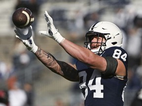 Penn State tight end Theo Johnson (84) warms up for an NCAA college football game against Rutgers, Saturday, Nov.18, 2023, in State College, Pa. Johnson will be the lone Canadian tight end at the 2024 Reese's Senior Bowl.THE CANADIAN PRESS/AP/Barry Reeger