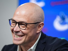 Vancouver Canucks general manager Patrik Allvin laughs during the NHL team's end-of-season news conference, in Vancouver, on Monday, April 17, 2023. The Canucks say they have signed Allvin to a multi-year contract extension.
