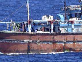 This photograph provided by the Indian Navy shows an Iranian fishing vessel named, Iman, that was hijacked by pirates after the same was intercepted by the navy off the east coast of Somalia, Monday, Jan.29, 2024. The Indian navy said Monday, it freed the vessel as well as all the 17 crew members who had been taken as hostages by the pirates. (Indian Navy via AP)