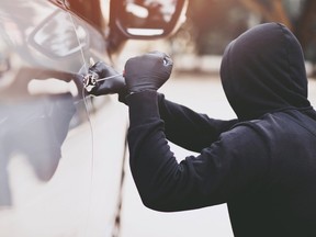 A man attempts to steal a car
