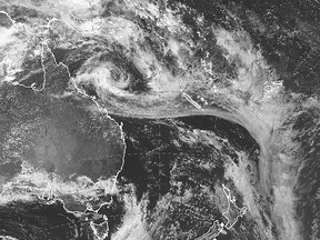 In this satellite image provided by the Japan Meteorological Agency/Australian Bureau of Meteorology, the potential cyclone Kirrily is shown off Australia's east coast Wednesday, Jan 24, 2024. A tropical low strengthening over the Coral Sea is finally expected to become a tropical cyclone later on Wednesday, days after it was first expected to appear off the northern coast of Australia.