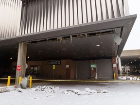 Debris from a roof in one of the parkades at West Edmonton Mall is seen on Sunday, Jan. 21, 2024, after part of it collapsed, almost landing on a passing car on Saturday night, Jan., 20, 2024.