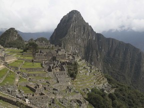 FILE - The Machu Picchu archeological site is devoid of tourists while it's closed amid the COVID-19 pandemic, in the department of Cusco, Peru, Oct. 27, 2020. Cusco, the town closest to the Inca citadel of Machu Picchu, is nearly empty of tourists on Jan. 31, 2024 as workers protest the government's outsourcing ticket sales to one large private company, saying it could hurt small tourism companies that offer lodging, food and logistics.