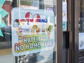 A sign that reads "Hate has no home here" is pictured in a business on the main street in Norwich.