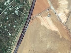 machinery building a wall along the Egypt-Gaza Strip border in Rafah, Egypt