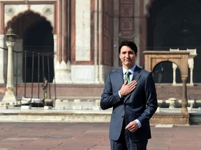 Canada's Prime Minister Justin Trudeau poses for a photo during a visit to the Jama Masjid, one of India's largest mosques, in New Delhi on Feb. 22, 2018.