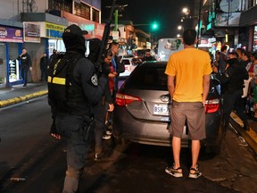 Police and nightclub-goers in San Jose, Costa Rica.