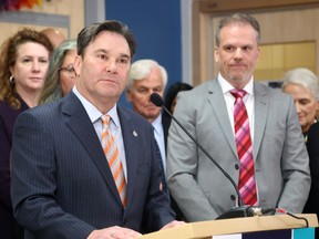 NDP MP Don Davies and Health Minister Mark Holland.