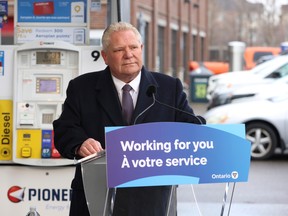 Ontario Premier Doug Ford speaks at a Pioneer gas station in Mississauga's Port Credit area on Tuesday, Feb. 13, 2024.