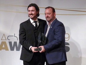 Cavalry FC's Tommy Wheeldon Jr. receives his coach of the year award from commissioner David Clanachan, in Toronto, Tuesday, Nov. 26, 2019.&ampnbsp;Wheeldon Jr. cast his mind back to a 1985 Hollywood movie when asked about his CPL team's preparations for Wednesday's CONCACAF Champions first-leg match against Major League Soccer's Orlando City SC.