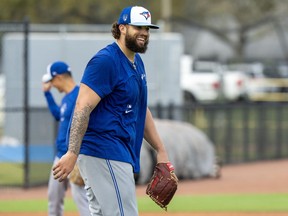 Toronto Blue Jays pitcher Alek Manoah laughs during a fielding drill in Spring Training action in Dunedin, Fla. on Friday February 16, 2024.