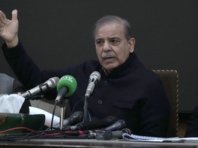 Pakistan's former Prime Minister Shehbaz Sharif speaks during a press conference regarding parliamentary elections, in Lahore, Pakistan, Tuesday, Feb. 13, 2024. Sharif, the main political rival of ex-Pakistani premier Imran Khan challenged him Tuesday to form a government if he had the support of the majority of the newly elected lawmakers in the parliament.
