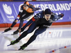Jordan Stolz, right, of the United States, and Tim Prins, of the Netherlands, race during the men's 1000-metre event at the ISU World speedskating Championships in Calgary, Alta., Saturday, Feb. 17, 2024.&ampnbsp;Speedskating star Jordan Stolz of the United States won his second gold medal in as many days at the world championship with Saturday's victory in the 1,000-metre event.