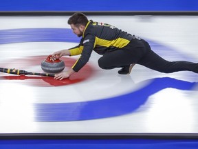 Team Wild Card One skip Mike McEwen makes a shot as he plays Team British Columbia at the Brier in Calgary, Alta., Sunday, March 7, 2021. McEwen has played in seven Canadian men's curling championships for Manitoba. He's about to experience wearing Saskatchewan colours in Regina at the 2024 Montana's Brier.