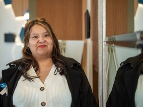 Vanessa Burns, who had been in a domestic partnership with Myles Sanderson for 14 years, stands for a photograph during an afternoon break at the inquest into the apprehension and death of Myles Sanderson, who killed 11 people and injured 17 others on James Smith Cree Nation and the nearby community of Weldon back in September 2022, held at a hotel conference room in Saskatoon, Wednesday, Feb. 28, 2024.