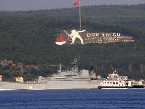 FILE - A Russian ship named Caesar Kunikov passes through the Dardanelles strait in Turkey en route to the Mediterranean Sea, on Oct. 4, 2015. Ukraine's military said Wednesday Feb. 14, 2024 it sank a Russian landing ship in the Black Sea using naval drones, a report that has not been confirmed by Russian forces. The Caesar Kunikov amphibious ship sank near Alupka, a city on the southern edge of the Crimean Peninsula that Moscow annexed in 2014, Ukraine's General Staff said. It said the ship can carry 87 crew members.