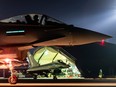 A Royal Air Force Typhoon aircraft prepares to take off,