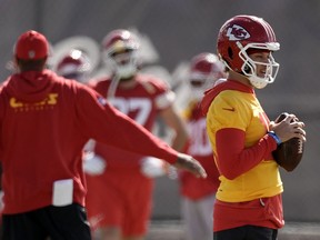 Kansas City Chiefs quarterback Patrick Mahomes, right, waits to start a drill during practice for Super Bowl 58 Friday, Feb. 9, 2024 in Henderson, Nev. The Chiefs will play the NFL football game against the San Francisco 49ers Sunday in Las Vegas.