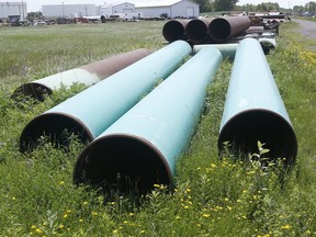 FILE - Pipeline used to carry crude oil sits at the Superior, Wis., terminal of Enbridge Energy, June 29, 2018. An attorney for energy company Enbridge worked Thursday, Feb. 8, 2024, to persuade a federal appellate court to vacate an order to shut down a portion of a pipeline that runs through a Wisconsin tribal reservation within three years.
