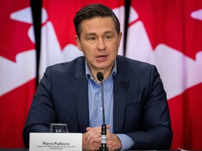 Conservative Leader Pierre Poilievre speaks during a press conference in Vancouver on Thursday, Feb. 8, 2024. Poilievre says a Conservative government will establish mandatory minimum prison sentences for people convicted of extortion.