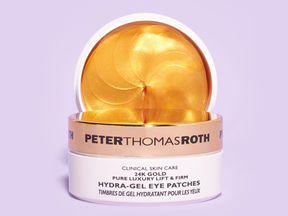 Peter Thomas Roth 24K Gold Pure Luxury Lift & Firm Hydra-Gel Eye Patches, one front facing one jar open with patches showing. Purple backdrop.