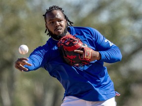 Toronto Blue Jays Vladimir Guerrero Jr. throws a ball in a drill during Spring Training action in Dunedin, Fla. on Monday February 19, 2024. Position players have arrived at the Blue Jays' camp as spring training continues ahead of Saturday's pre-season opener.