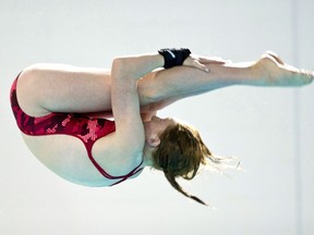 Canada picked up two high-diving medals at the world aquatics championships Wednesday as Molly Carlson earned silver and Jessica Macaulay earned bronze in the women's 20-metre event. Carlson performs a dive at the Canada Games, Thursday, August 15, 2013 in Sherbrooke, Que.