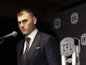 The commissioner of the Canadian Football League defended his organization's approach to handling an investigation into Toronto Argonauts quarterback Chad Kelly. Kelly with his award for Most Outstanding Player at the 2023 Canadian Football League (CFL) Awards in Niagara Falls, Ont. Thursday, Nov. 16, 2023.