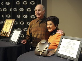 FILE - Former Green Bay Packers quarterback Bart Starr, left, and his wife Cherry Starr appear at the Packers Hall of Fame in Green Bay, Wis., Sept. 18, 2010, to announce their donation of three of Bart's World Championship rings, Cherry's necklace and other items. Philanthropist Cherry Starr has died Tuesday, Feb. 27, 2024, according to Rawhide Youth Services, an organization that helps at-risk youth that the couple worked closely with.