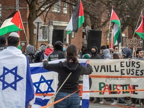 Jewish and pro-Palestinian groups protested outside the Spanish and Portuguese synagogue, which hosted a presentation about real estate in Israel in Montreal on March 5, 2024.