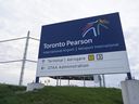A sign for Toronto Pearson International Airport is pictured in Mississauga, Ont., on Thursday, April 20, 2023.