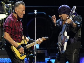 Bruce Springsteen and Stevie Van Zandt on stage.