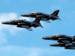 Four CT-155 Hawk jets in flght.