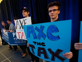 Supporters wait for Pierre Poilievre, then a a leadership candidate for the federal Conservative party and now its leader, to arrive at an anti-carbon tax rally in Ottawa on March 31, 2022.