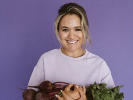 Carleigh Bodrug holding radishes