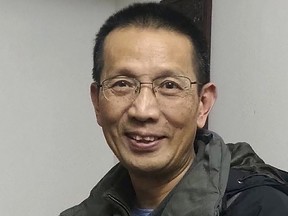 Rev. John Sanqiang Cao