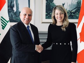 Iraqi Foreign Minister Fuad Hussein, left, meets with Foreign Affairs Minister Mélanie Joly in Ottawa on March 19.