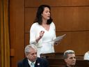 NDP MP Heather McPherson rises to introduce a motion on the situation in the Middle East, Monday, March 18, 2024. She later agreed to amendments to the motion that removed a commitment to recognize a Palestinian state.
