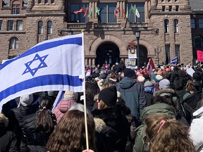 Hundreds gather outside Queen's Park to rally against anti-semitism in Toronto, Ont. on March 24.