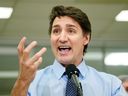 Prime Minister Justin Trudeau answers questions at a news conference in Calgary on Wednesday, March 13, 2024.