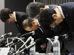 Kobayashi Pharmaceutical Co. President bows