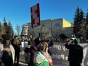 Jewish and other community members rally outside a synagogue in Thornhill as anti-Israel demonstrators denounce Israel, March 7, 2024.