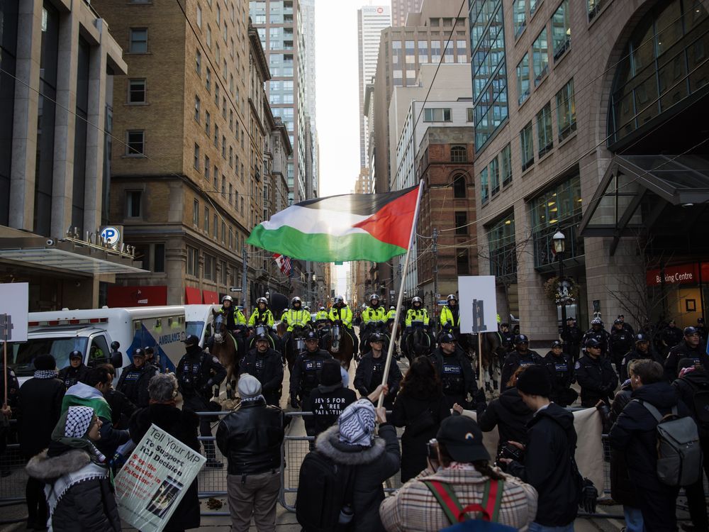 NextImg:Toronto police make arrests during weekend protest, draw criticism from demonstrators