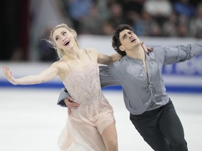 Piper Gilles and Paul Poirier of Canada perform their free dance in the ice dance competition at the 2024 ISU World Figure Skating Championships in Montreal, Saturday, March 23, 2024.