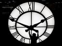 Electric Time technician Dan LaMoore adjusts a clock hand in 2021 on a clock constructed for a resort in Vietnam. Canada switches to daylight saving time on March 10 at 2:00 a.m. local time.